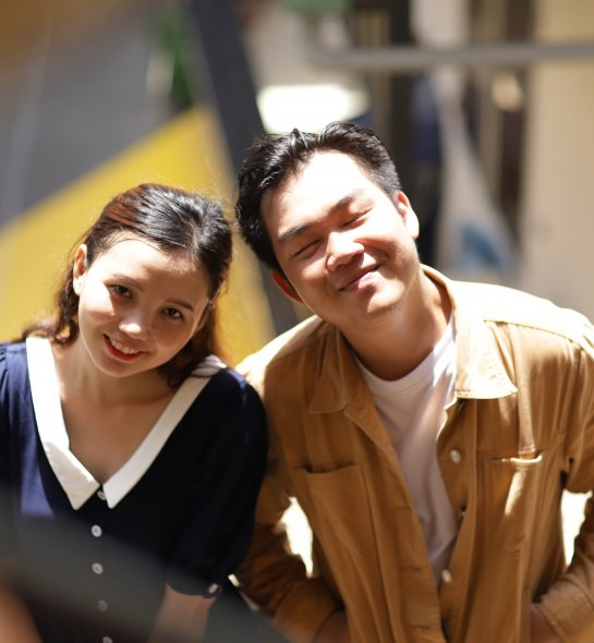 two students smiling